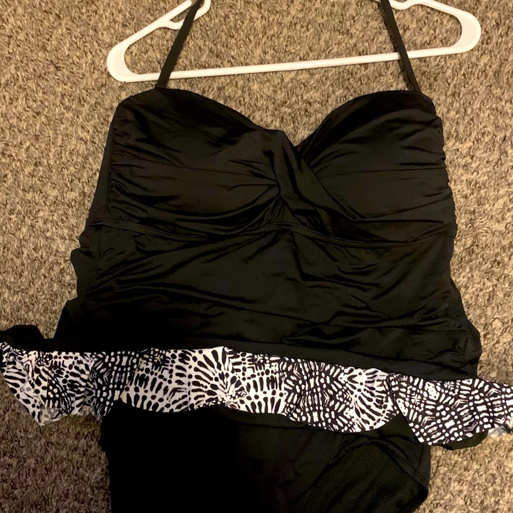 One piece ANA Swimsuit.  New with tags!! Size 16